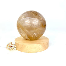 Load image into Gallery viewer, Crystal Lamps NZ: Large golden healer crystal sphere on LED lamp base
