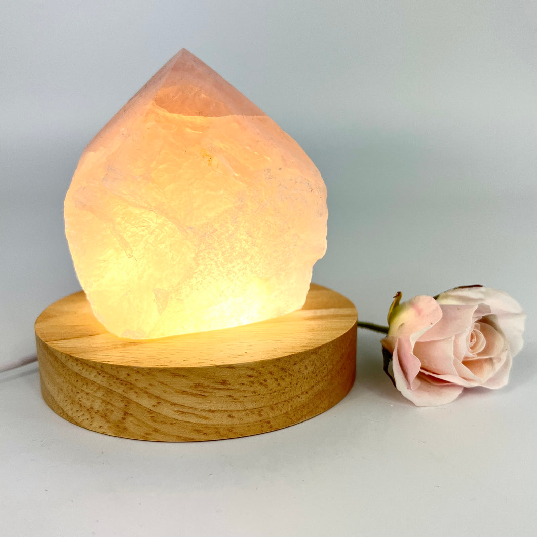 Crystal Lamps NZ: Rose quartz crystal lamp on LED wooden base