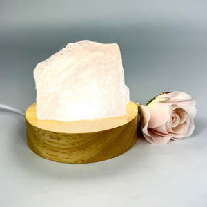 Crystal Lamps NZ: Rose quartz crystal lamp on LED wooden base