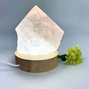 Crystal Lamps NZ: Rose quartz crystal lamp on LED wooden base