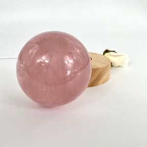 Crystal Lamps NZ: Rose quartz crystal sphere lamp on LED wooden base