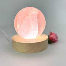 Load image into Gallery viewer, Crystal Lamps NZ: Rose quartz crystal sphere lamp on LED wooden base
