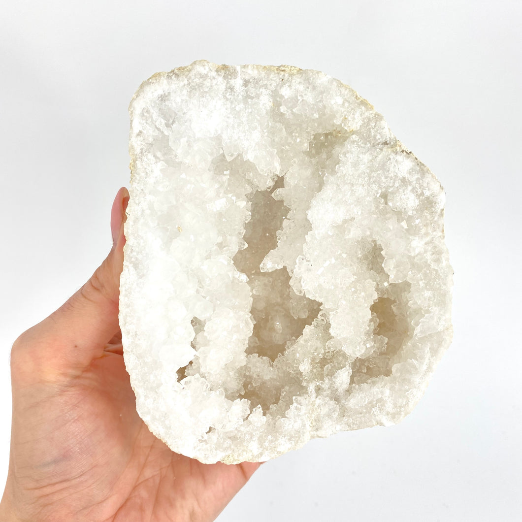 Crystals NZ: Clear quartz crystal geode half