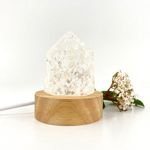 Crystals NZ: Clear quartz crystal point on LED lamp base