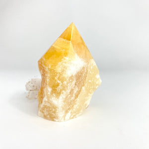 Crystals NZ: Orange calcite crystal point
