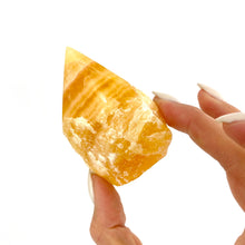Load image into Gallery viewer, Crystals NZ: Orange calcite crystal polished point
