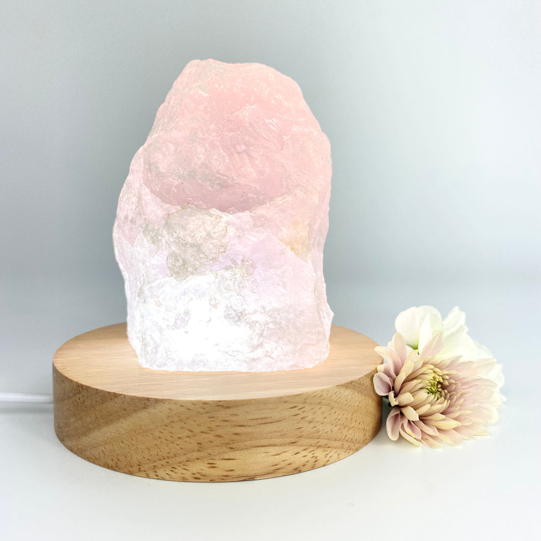 Crystal Lamps NZ: Rose quartz crystal lamp on LED wooden base