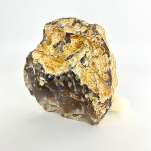 Large agate polished crystal cave with cut base