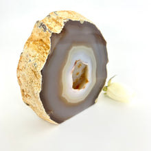 Load image into Gallery viewer, Large Crystals NZ: Large agate polished crystal cave with cut base
