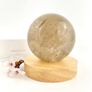 Large crystals NZ: Large smoky quartz crystal sphere on LED lamp base